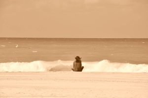 Alone on the Beach Woman sitting Sepia Photography print